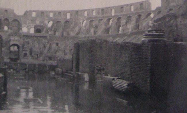 Colosseum in Rome, Italy 1945. Notice the water standing. During historic times the Roman would have Naval battles inside the Colosseum.