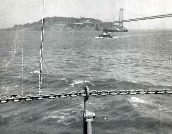 USS Leo going under the Golden Gate bridge to serve in the Korean War.