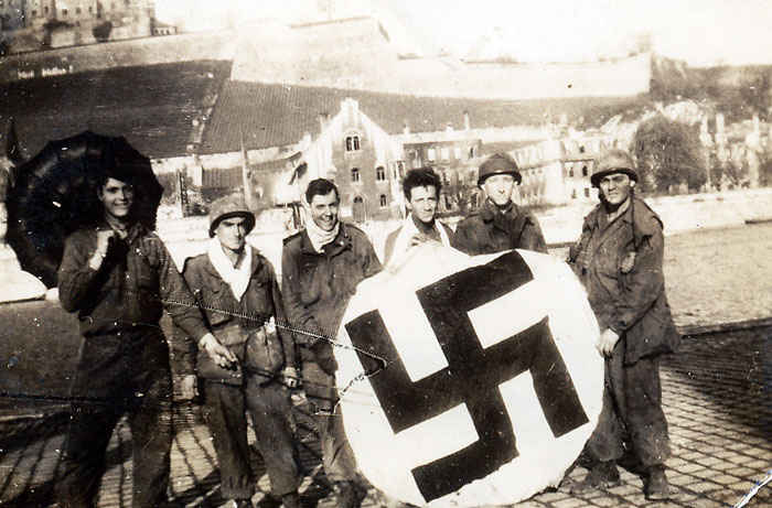 Wurzburg, Germany the first town that my grandfather fought in. Parker is far left, my grandfather is second from the right. About 85% of the city was destroyed by Lancaster bombers. My grandfather arrived in Wurzburg a couple weeks after the fire bombing that destroyed the city.