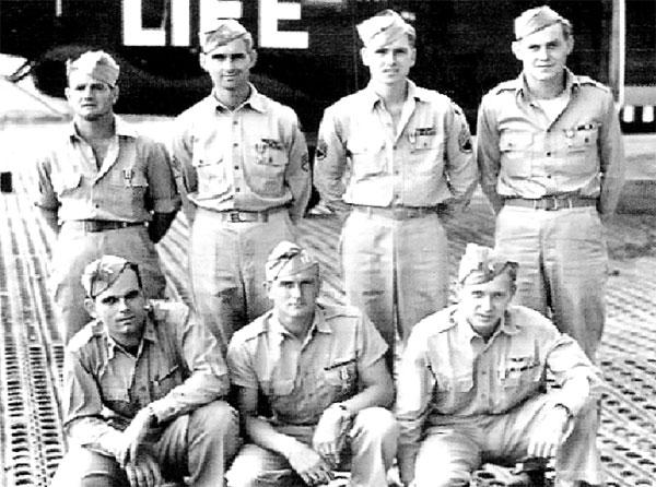 Flak Shak B-24 Crew members. Top Left:  Ed Hartupee, ballgunner; Virgil Anderson, top gunner; Francis Brittain Jr. nosegunner;  Robert Hickman, tailgunner. Bottom Left: Kenneth Leasure, navigator; Volney Wiggins, pilot; Matthew Hall, copilot.   Missing due to wounds were John P. Dempsey, bombardier; Martin J. Caine, radio operator; Wilson B. Shimer, engineer.