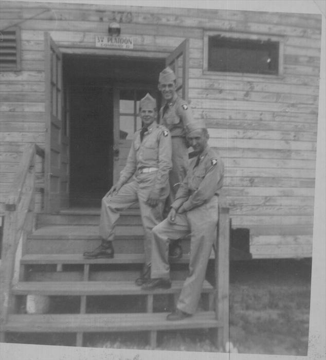 Camp Breckinridge, Morgantown, Kentucky.  Dad, 21 years old, upper right. Other men unknown. 
Dad was with Company G, 3rd Platoon.   Road Seven was the location of this barrack.
Note the Screaming Eagle patch minus the "Airborne" tab on the mens' shoulders.   At the time of this photo, the 101st Airborne provided basic training not airborne training.  Mark Bando's site, http://www.101airborneww2.com/eaglepatchcorner.html, states WWII vets were angry that Basic Trainees were awarded the "Screaming Eagle" patch.
Here's a thought from Ralph Alvarez, Museum Technician, 82nd Airborne Division Museum, "Even though the 101st wasn't airborne when it was reactivated I am sure the cadre were airborne qualified and were hard on the troops. Being airborne doesn't make us any braver."
Hoyt Bruce Moore, III, webmaster of http://www.506infantry.org, is certain Dad's Company G was part of either the 502nd, 506th, and 516th Airborne Infantry Regiments.