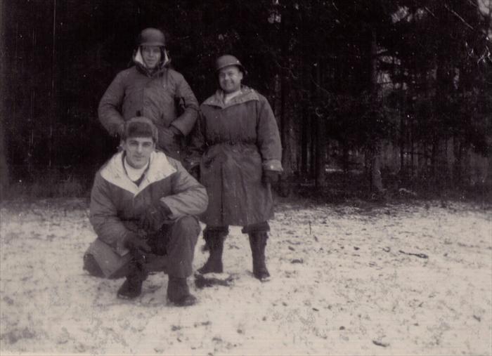 Dad, stooped, Smitty and Cpl. Clarence Werre (at right), on maneuver in Germany, 1951-1953.  Dad wrote on the back of the photo the men were awarded white scarves for so much time on maneuvers.