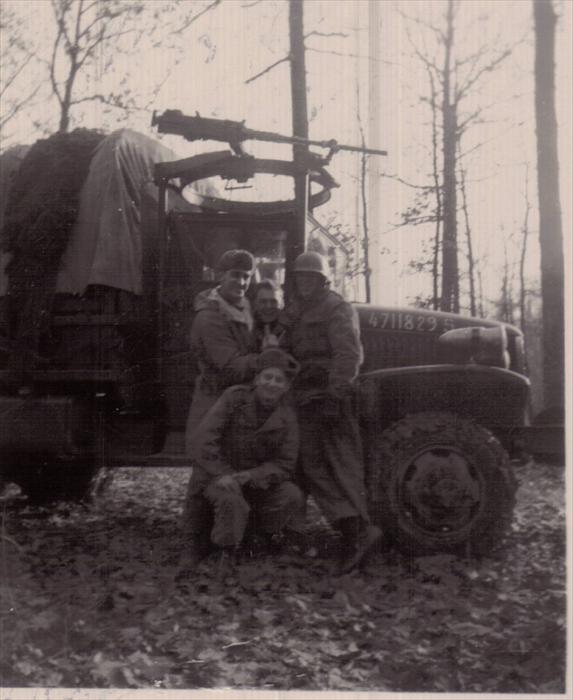 Dad (left,) "English, "Stretch", Iusiak (stooped) on maneuver, 1951-1953, Germany.