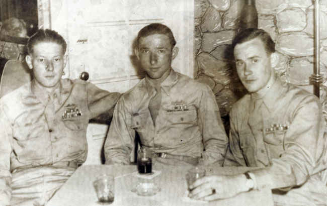 This is the last picture of my grandfather in his Army uniform. This was taken in New York shortly after he arrived on a merchant ship back from Europe, July 1946. Left Roy Brown, Thomas Buettner, Joseph Brooks.