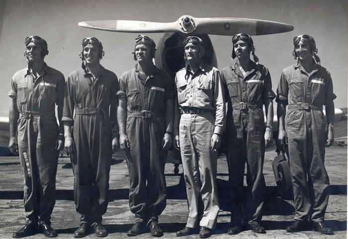 Left in front of the PT19 Fairchild trainer; Woodrow W. Wilson, Donald G. Allen, John O. Pettay, L W Jolly, Arthur E. Newton, Stephen E. VanNostrand.