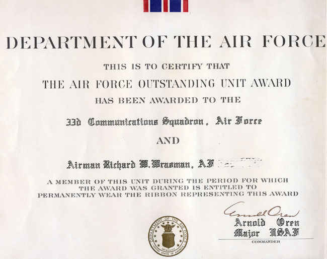 Air Force oustanding unit award to the 33rd Communications Squadron.