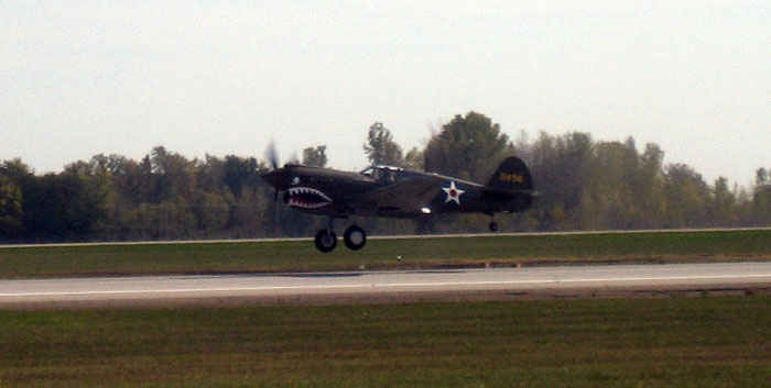 P-40 Warhawk. Made famous by the Flying Tigers, it was a air supremacy fighter, bomber escort and fighter.