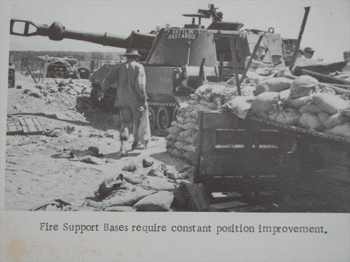 A fire support base is always in need of repairs. The back blast from the mussel reaps havik on sandbags.   (4th section b btry  1/27)