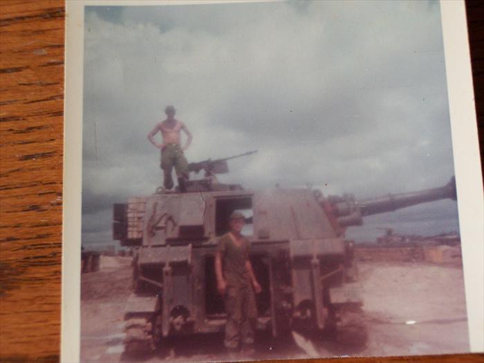 I think these guys were doing some cleaning or maybe getting ready for a road trip. That's  Mike from LA. at the rear of the gun and the guy on top i can;t remember his name but i know he had a bad case of sun poison