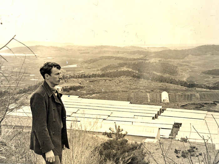 Dennis in Korea sightseeing a mink farm 1974.