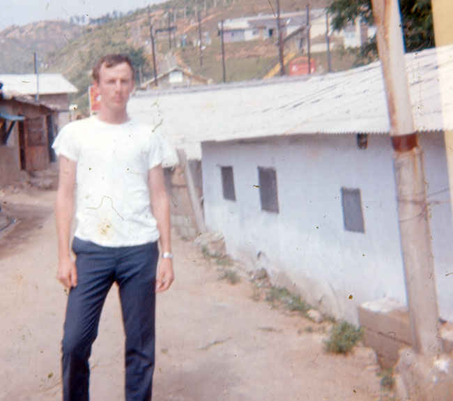 Korea Dennis in village outside B Battery compound.