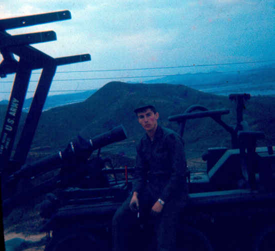 Korea  1973-1974 Dennis sitting on  a Hawk Missile Transporter.