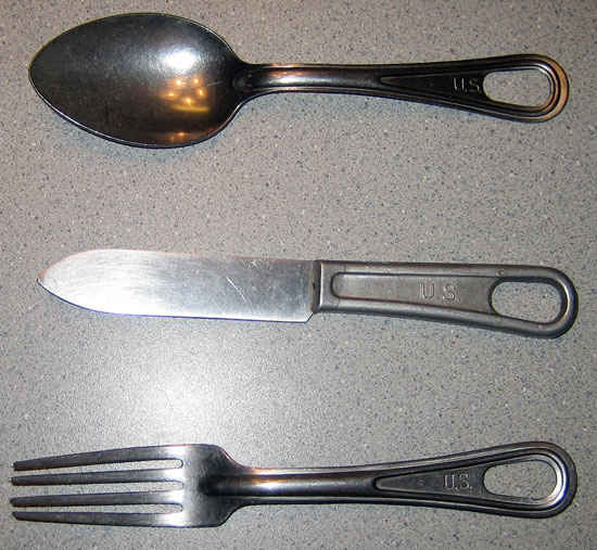 Utensils used by my grandfather. He said that the spoon was the best one and he used it for everything. The spoon is much larger than a tablespoon.