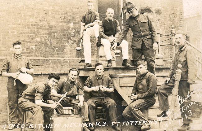 Edward is second to the right. This is a picture of 4th company kitchen mechanics Ft. Totten, New York.