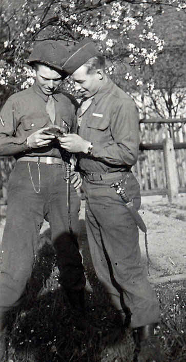 My grandfather was always with Sutton to the right. My grandfather and Sutton examine a pistol.