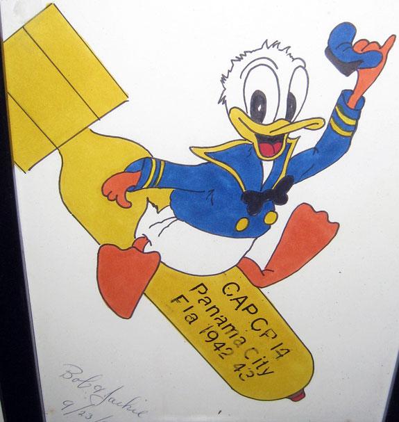 Robert loved to draw Disney characters. He drew the insignia for his Coastal Air Patrol group. Later he forgot about what he had drawn and drew this and sent it to his friend. When his friend died his family sent it back to Robert.
