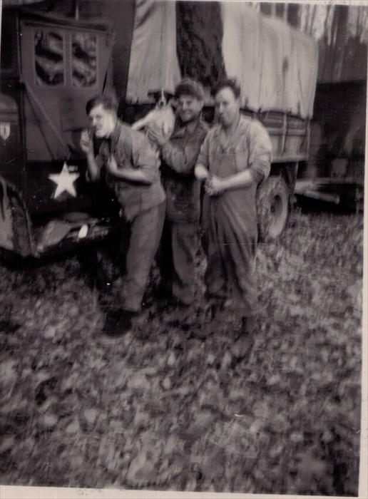 Unknown soldiers and 1st Inf. Div. Hq Co. mascot on maneuver 1951-1953