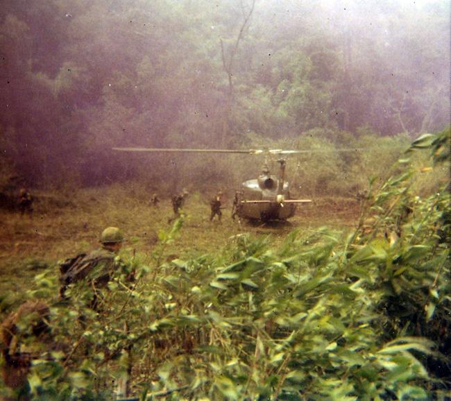 Huey picking up soldiers in Vietnam.