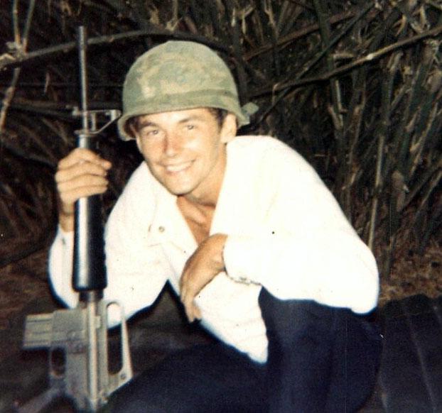 Clothes were sent out to the field so this soldier had to use some local attire in Vietnam.