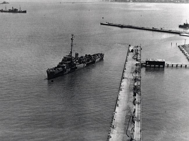 USS Koiner Destroyer Escort in Lakehurst, New Jersey on October 26, 1944. Painted in Dazzle Camouflage.