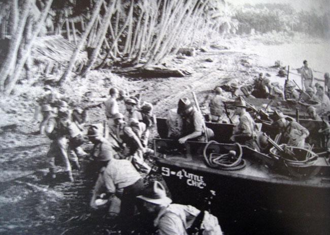 Rushing out of a Higgins boat during the Luzon Invasion. James was part of multiple invasions in the Philippines.