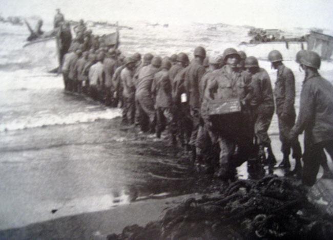 Getting supplies onto the beach during an invasion by the 25th Infantry Division in the Philippines.
