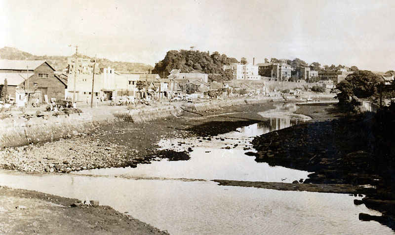 Picture of Sasebo, Japan. The tide comes in at night. When war broke out in Korea Sasebo became the main launching point for the United Nations and the U.S. Forces. Millions of tons of supplies flowed through Sasebo on their way to Korea. The number of Americans in Sasebo grew overnight and some 100 warships and freighters came through per day.