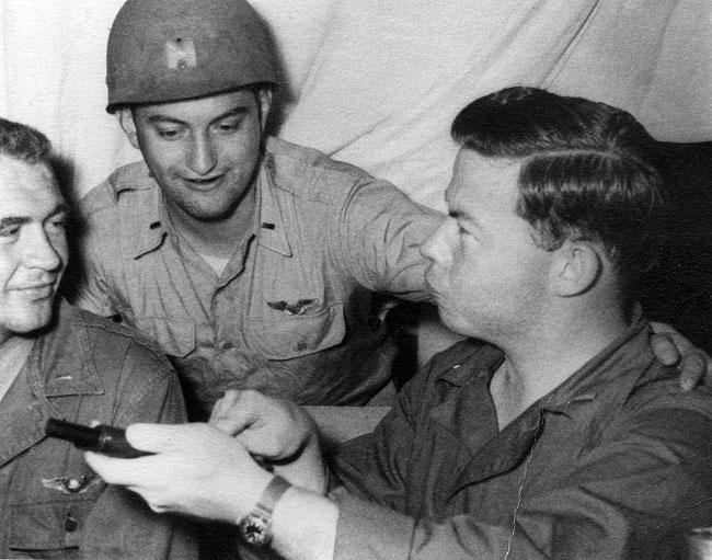 Clowning Around:  Morris Briggs showing the working of a pistol to Dave (left) and Charles (center).