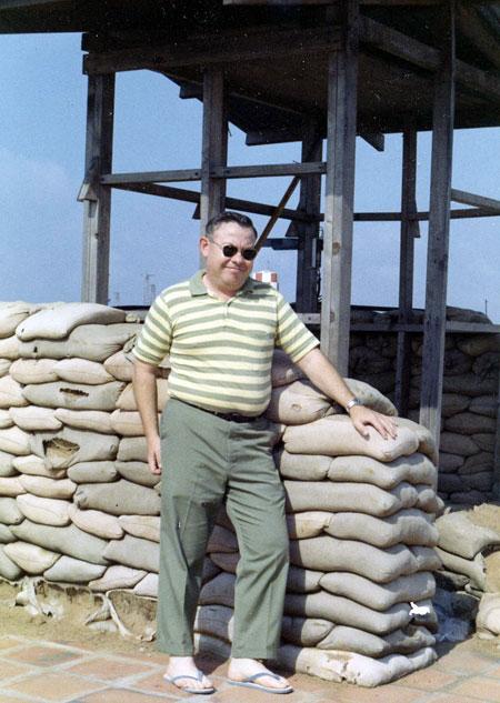 Morris Briggs standing at a revetment on Tan Sun Nhut