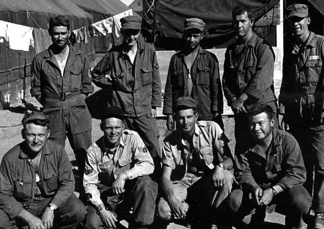 KC-97 tanker crew T-4, at survival training, Stead Air Force Base, NV, 1953: Front row L/R:  Capt. Porritt (Aircraft Commander); survival instructor (?); 1st Lt Worle (Co-pliot); Briggs (navigator).  Back Row:  L/R  M/Sgt Hill (Flight Engineer); Airman 1st Class Klekota (radio operator); Airman 1st Class Hall (boom operator); squadron intelligence airman (?); Airman 2nd Class Swieg (asst. boom operator)