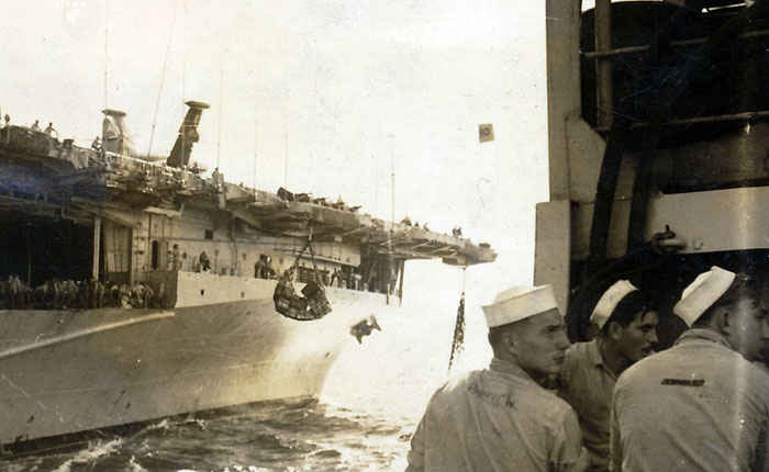 Loading ammunition to the USS Boxer.