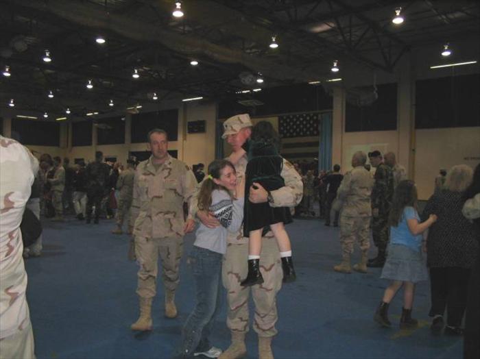 Two of my older girls welcoming me home.