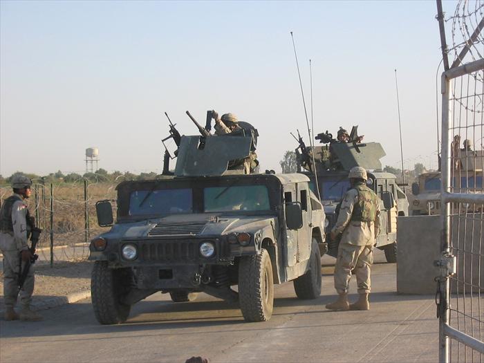 Military convoy entering the EECP main gate.