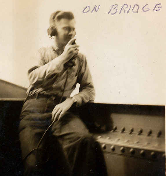 On the bridge talking on the phone. My grandfather spent much of his day here.