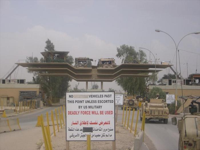 Picture of the North Entry Control Point (NECP) aka 'North Gate.'  This was the primary entry control point of the base and was the main departure and entrance for military convoys.  It was also where civilian and military supply trucks were inspected.